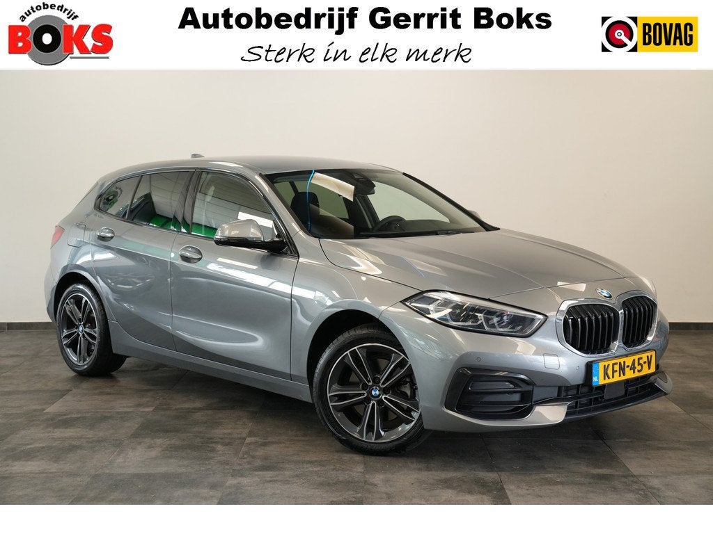 BMW 1-serie 118i Business Edition Plus Keyless Go PDC LED CA, Auto's, BMW, 136 pk, Gebruikt, Met garantie (alle), Leder en Stof