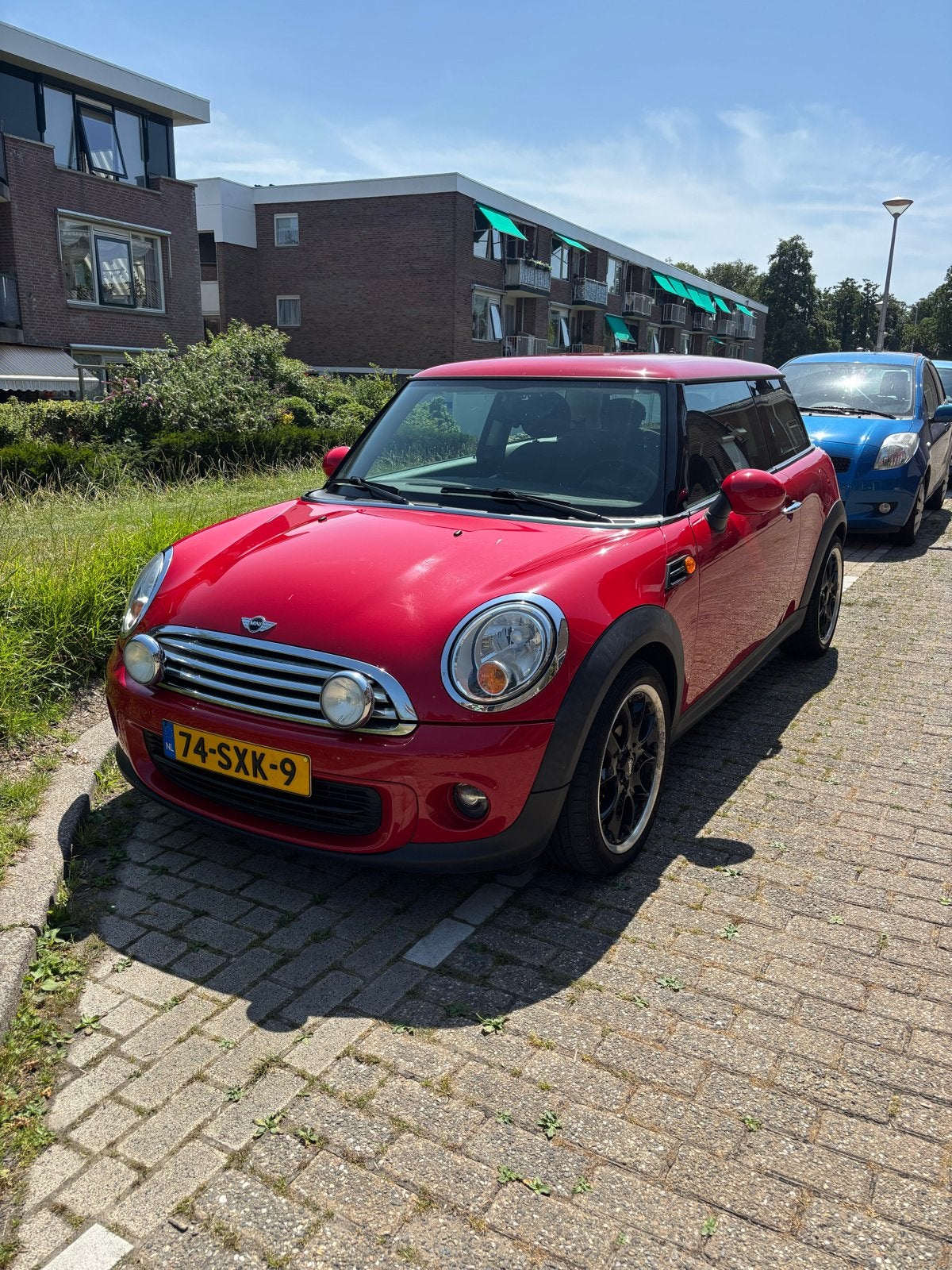 Mini 1.6 ONE 55KW 2012 Rood, Auto's, Voorwielaandrijving, 4 stoelen, Origineel Nederlands, Handgeschakeld