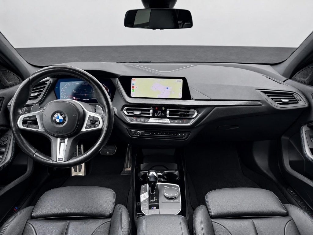 BMW 1-serie M135i xDrive High Executive Pano Head-up Keyless, Gebruikt, 4 cilinders, Zwart, Bedrijf