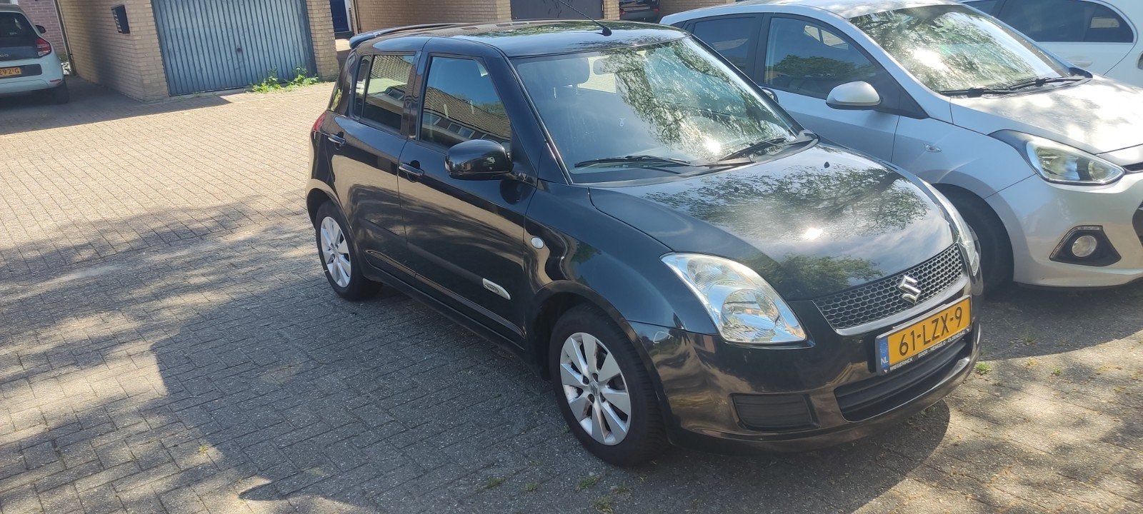 Suzuki Swift 1.3 5D 2010 Zwart, Auto's, Voorwielaandrijving, Stof, 40 €/maand, Zwart