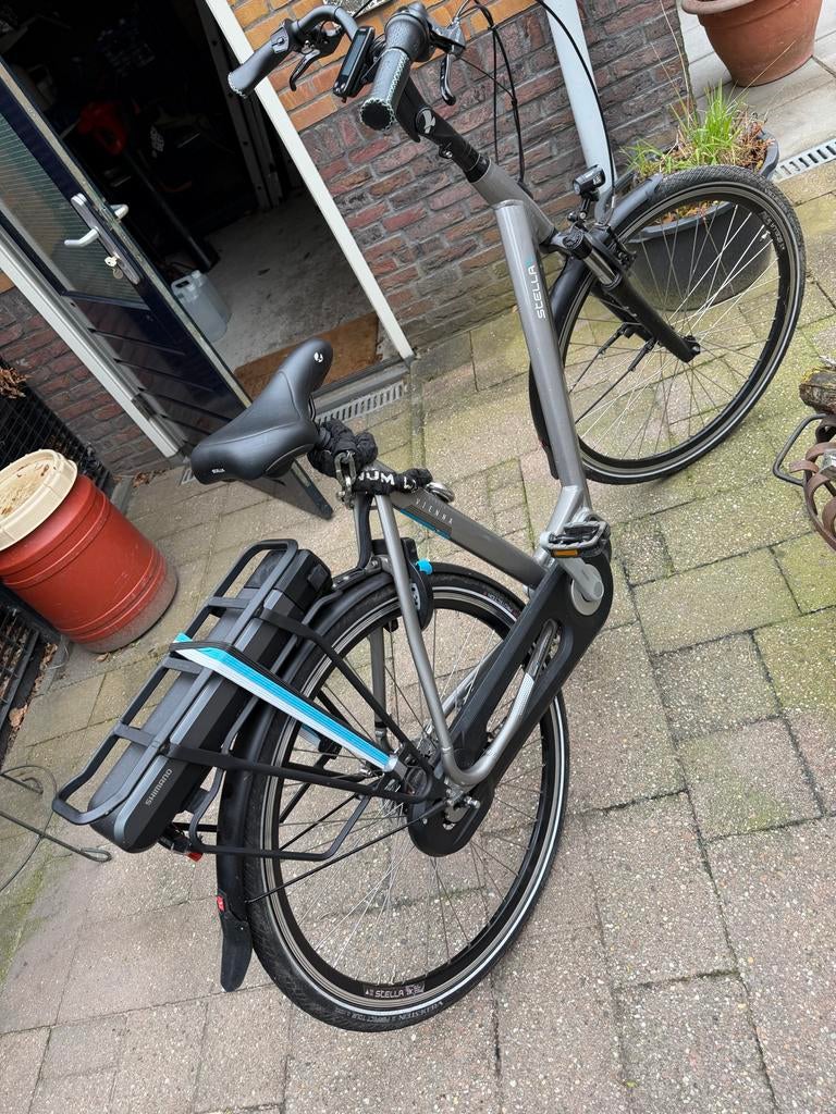Stella herenfiets - Comfortabel en betrouwbaar, Fietsen en Brommers, Elektrische fietsen, Gebruikt, 50 km per accu of meer, 55 tot 59 cm