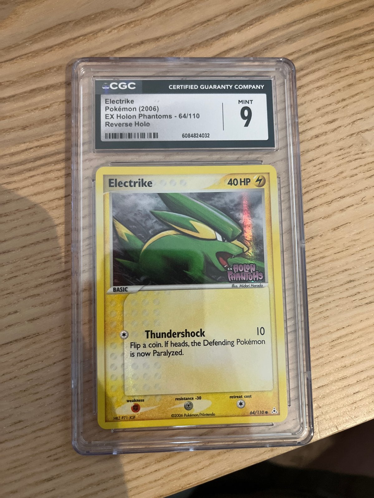 Electrike Pokémon Kaart (2006) EX Holon Phantoms CGC 9, Verzenden, Zo goed als nieuw, Losse kaart, Foil
