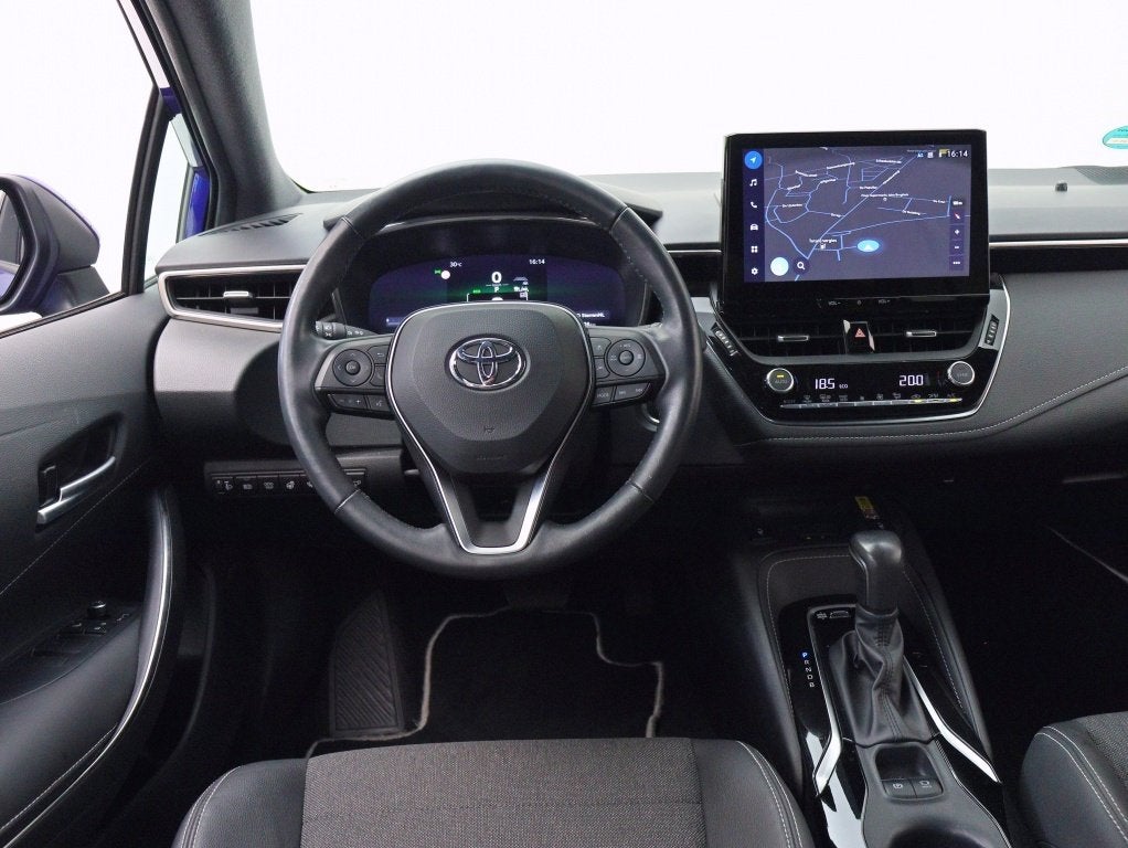 Toyota Corolla Touring Sports Hybrid 140 Business Plus | Tre, Auto's, Automaat, Gebruikt, 4 cilinders, Blauw