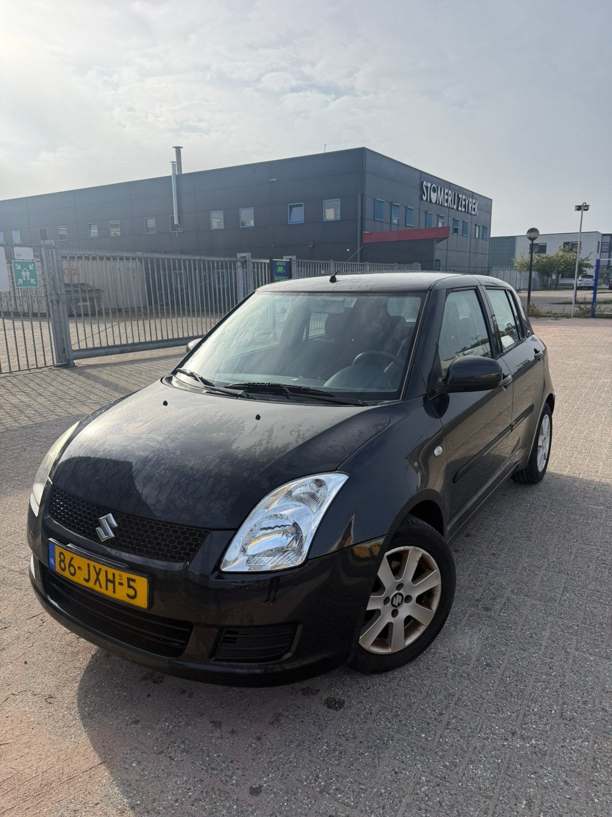 Suzuki swift 1.3 xpression 5D zwart APK 07-04-2027, Voorwielaandrijving, Stof, Handgeschakeld, Particulier
