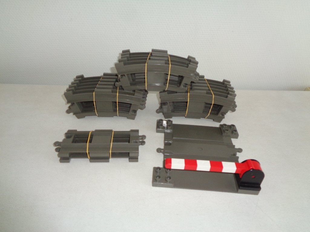 19 Duplo rails en overweg voor de Duplo trein., Ophalen of Verzenden, Zo goed als nieuw, Duplo