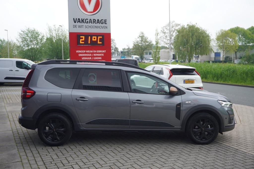 Dacia Jogger 1.6 Hybrid 140 Extreme 5p / Carplay / Camera /, Auto's, Dacia, Stof, Gebruikt, Grijs, Hybride Elektrisch/Benzine