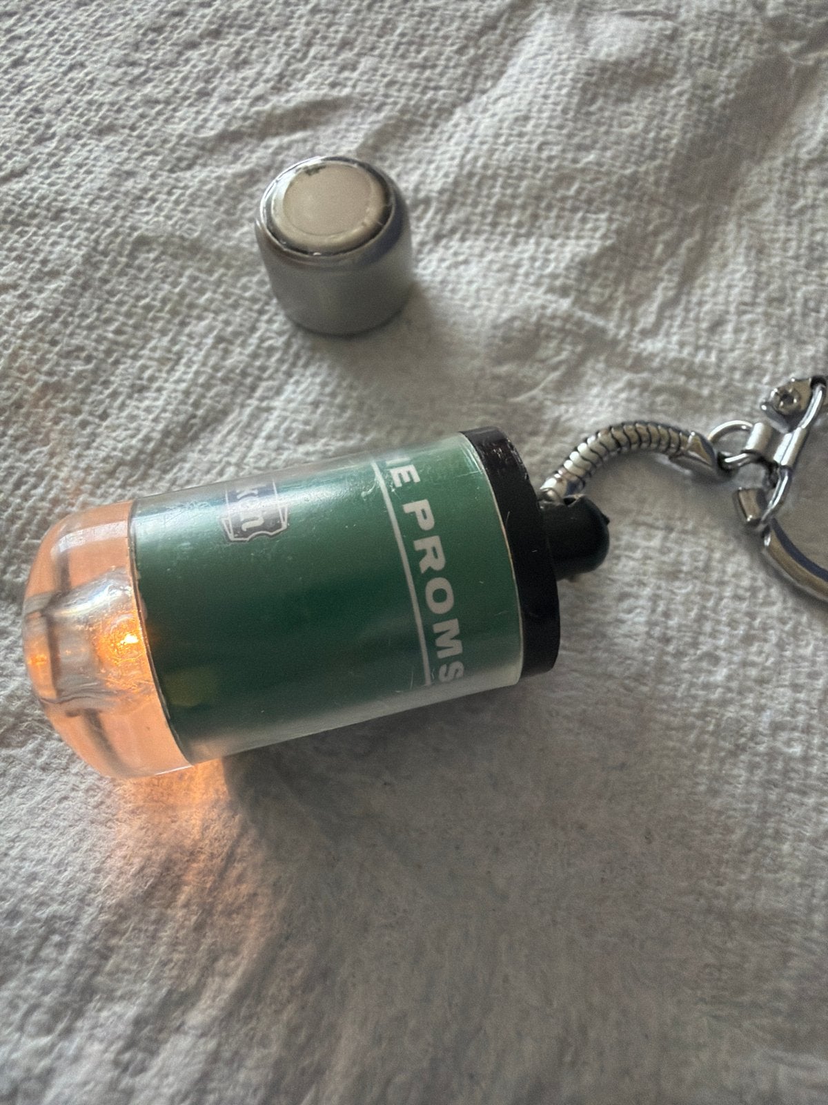 Collectors item: Heineken sleutelhanger met lichtje, Ophalen of Verzenden, Gebruikt, Merk