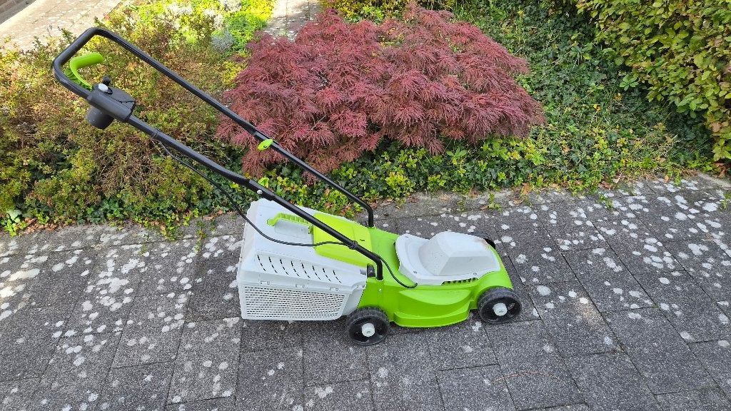 Foto 2 van Grasmaaier