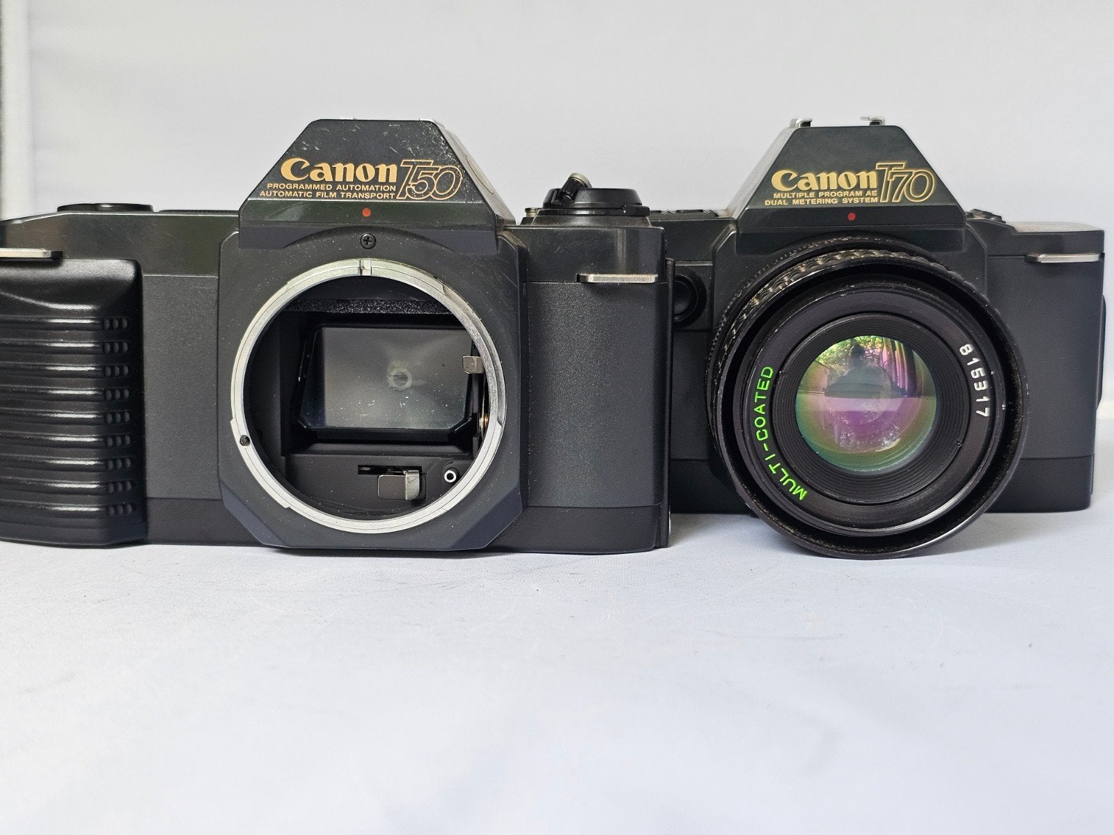 Canon T50 en Canon T70   Lezen!, Ophalen of Verzenden, Spiegelreflex, Canon
