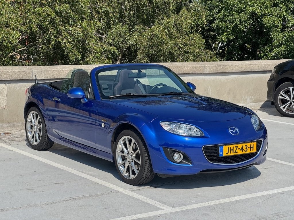 Mazda MX-5 1.8 20th Anniversary | 86.000 km, Zwart, 4 cilinders, Cabriolet, Blauw