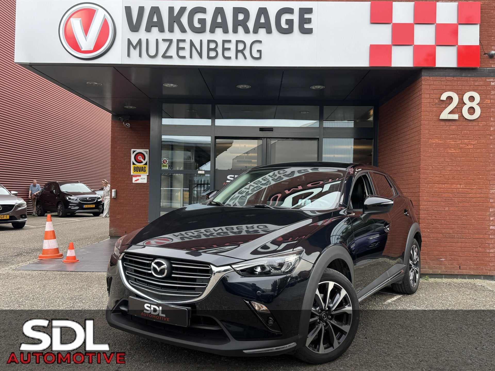 Mazda CX-3 2.0 SkyActiv-G 120 GT-M 40.000KM! // NAVI // CAME, Auto's, Gebruikt, Zwart, 4 cilinders, Leder en Stof