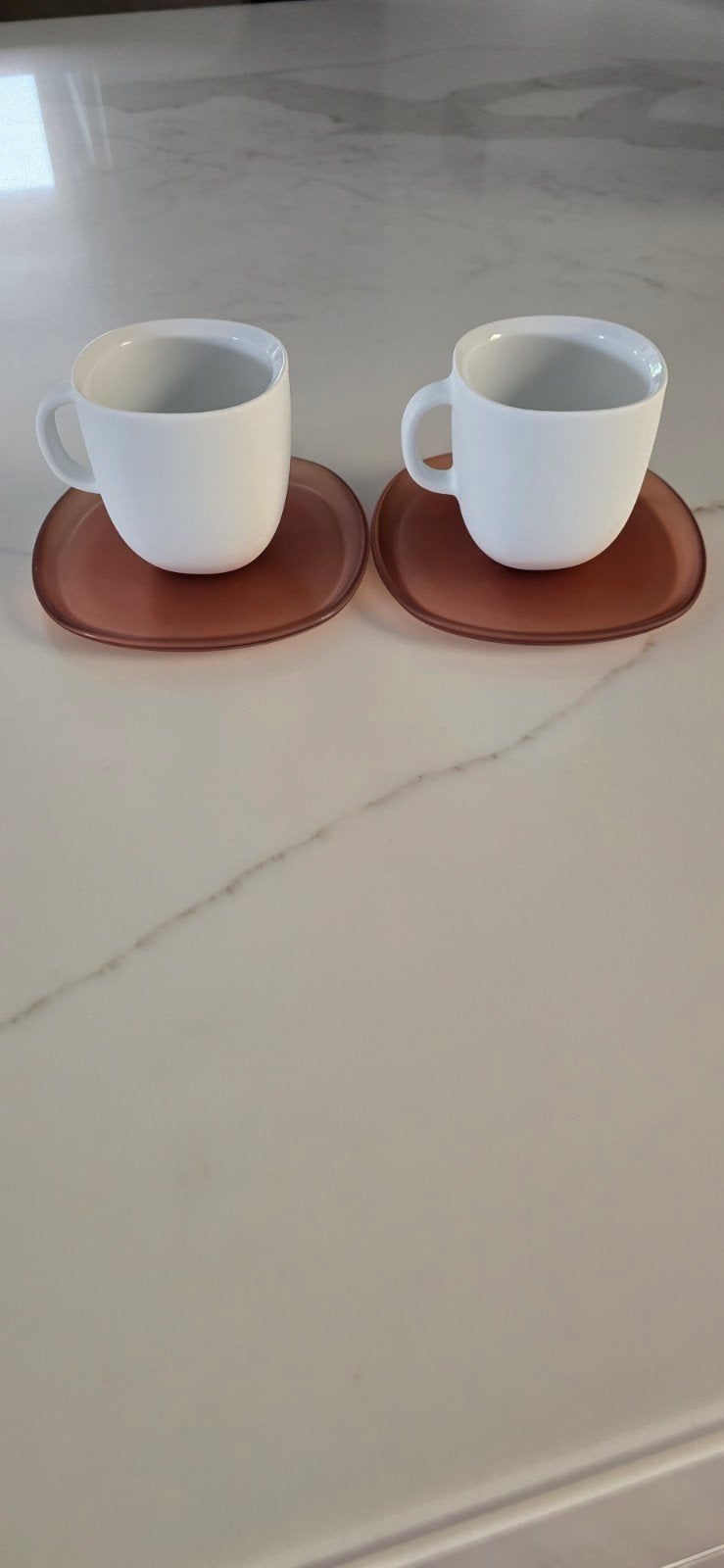 Nespresso kop en schotel set - 2 stuks, Ophalen of Verzenden, Zo goed als nieuw