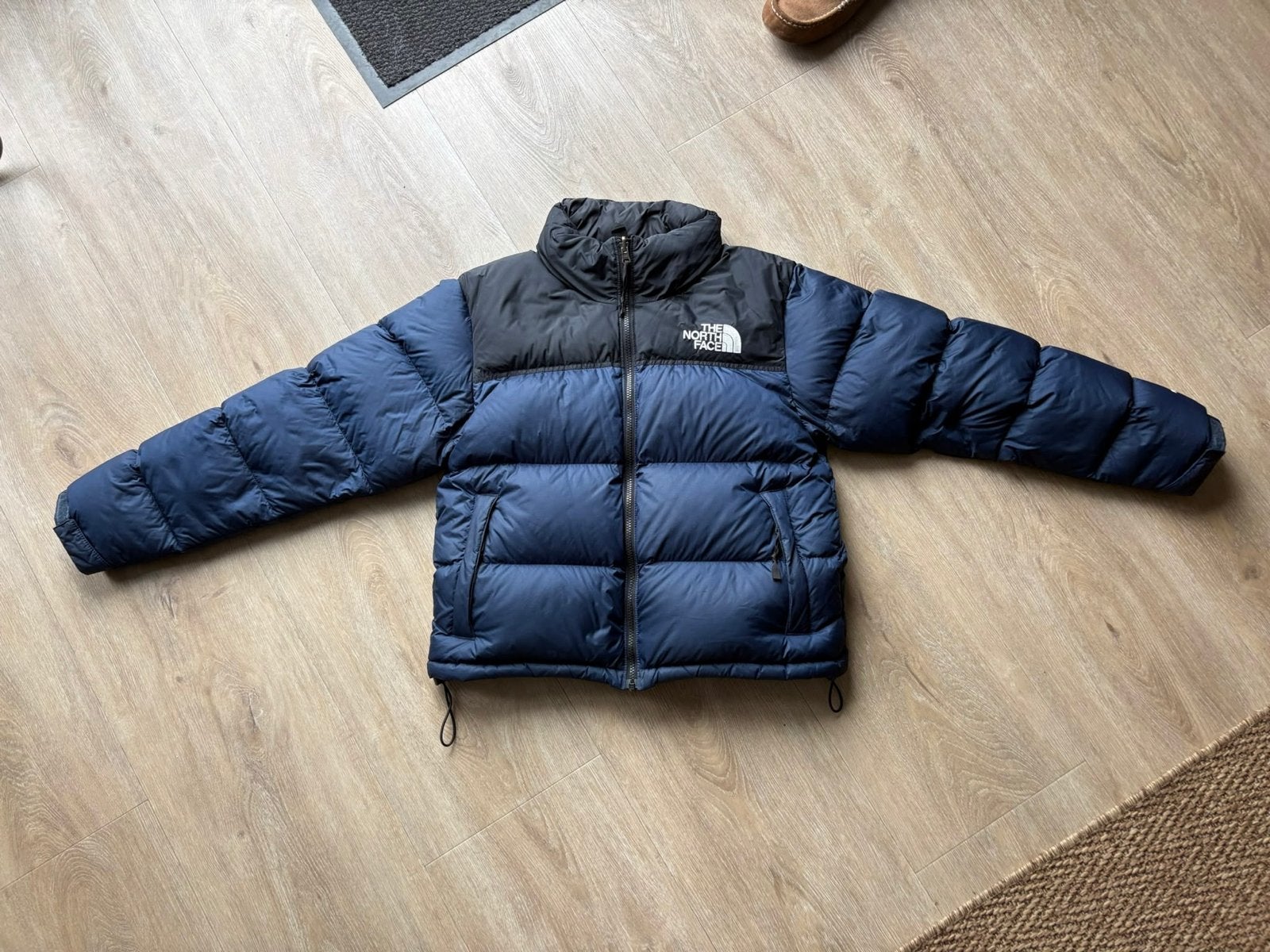 The North Face Nuptse Puffer Jas - mt M womans Blauw/Zwart, Ophalen of Verzenden, Gedragen, Maat 38/40 (M), Blauw