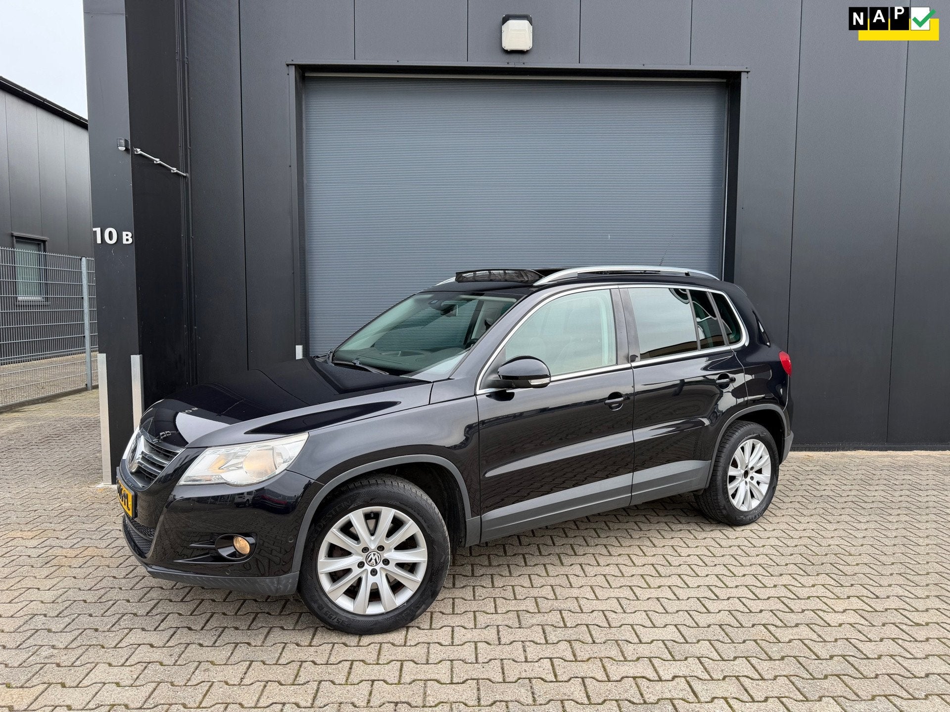 Volkswagen Tiguan 1.4 TSI Sport&Style 4Motion, Stof, Gebruikt, Zwart, 4 cilinders