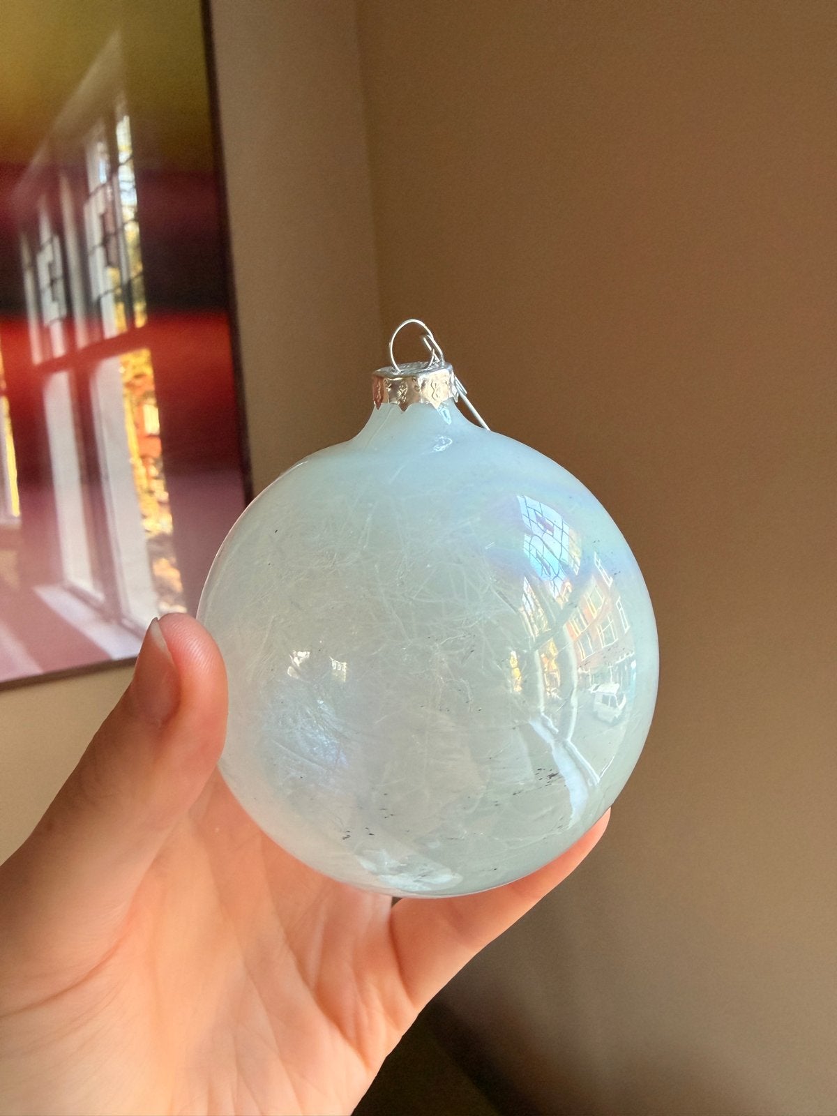 Licht blauwe kerstbal, Ophalen