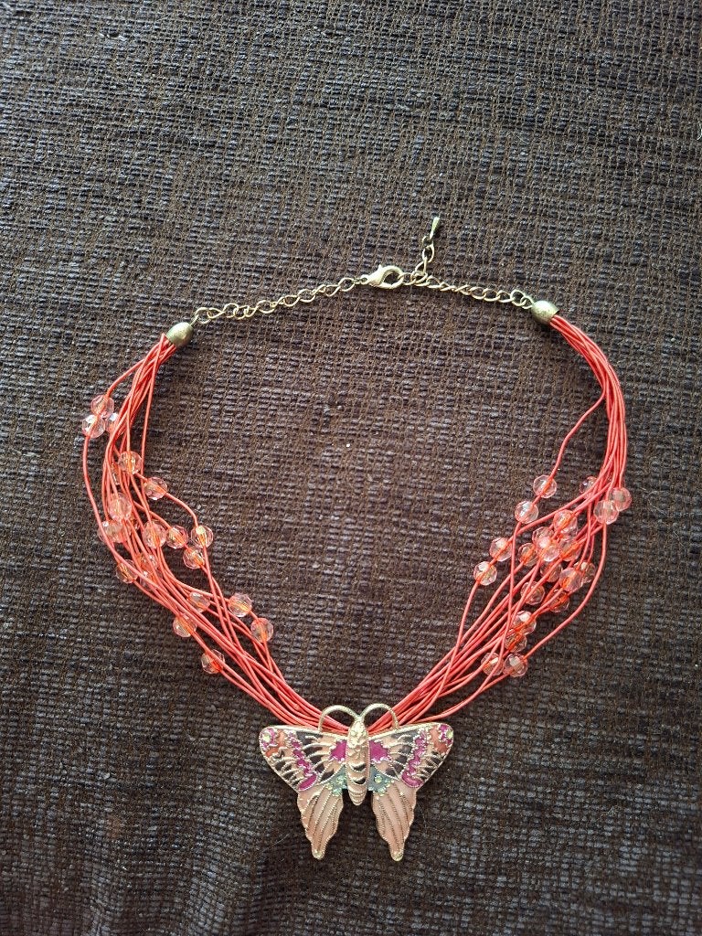 Halsketting vlinder roze, Gebruikt, Ophalen of Verzenden, Roze, Overige materialen