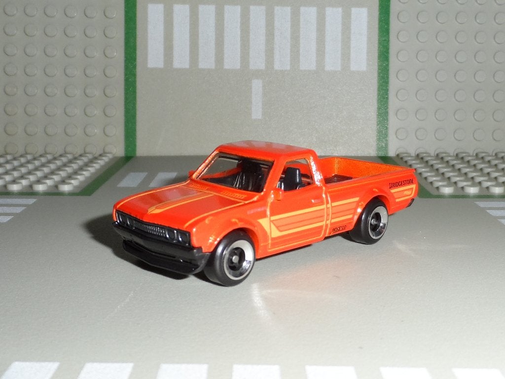 Hot Wheels - Datsun 620 (oranje) 1:64, Ophalen of Verzenden, Nieuw, Auto
