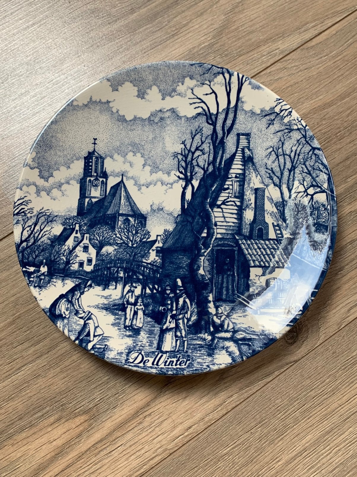 Delfts blauw bord winter, Ophalen