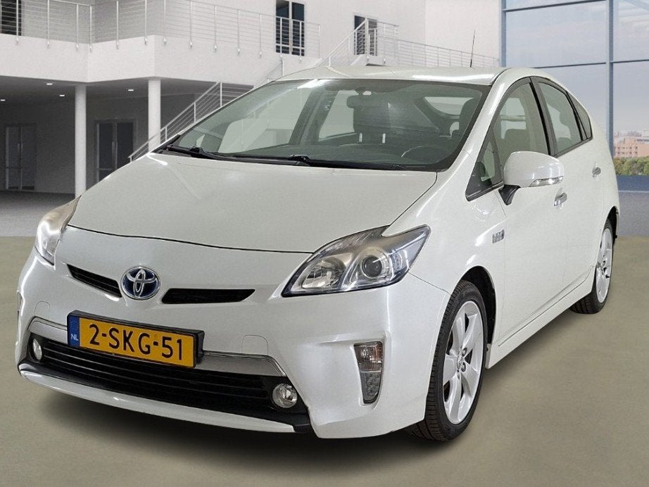 Toyota Prius 1.8 Plug-in Aspiration Automaat +NAP NL-auto, Auto's, Euro 5, Gebruikt, Leder en Stof, Wit