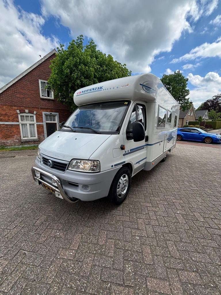 Adria Coral 650 SP bj 2006 dakairco met nap zeer goede staat, Caravans en Kamperen, Campers, Particulier, tot en met 4, Half-integraal