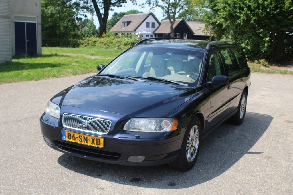 Volvo V70 2.4 D5 136KW Geartronic 2006 Blauw, Auto's, 1800 kg, Beige, Blauw, Stationwagon
