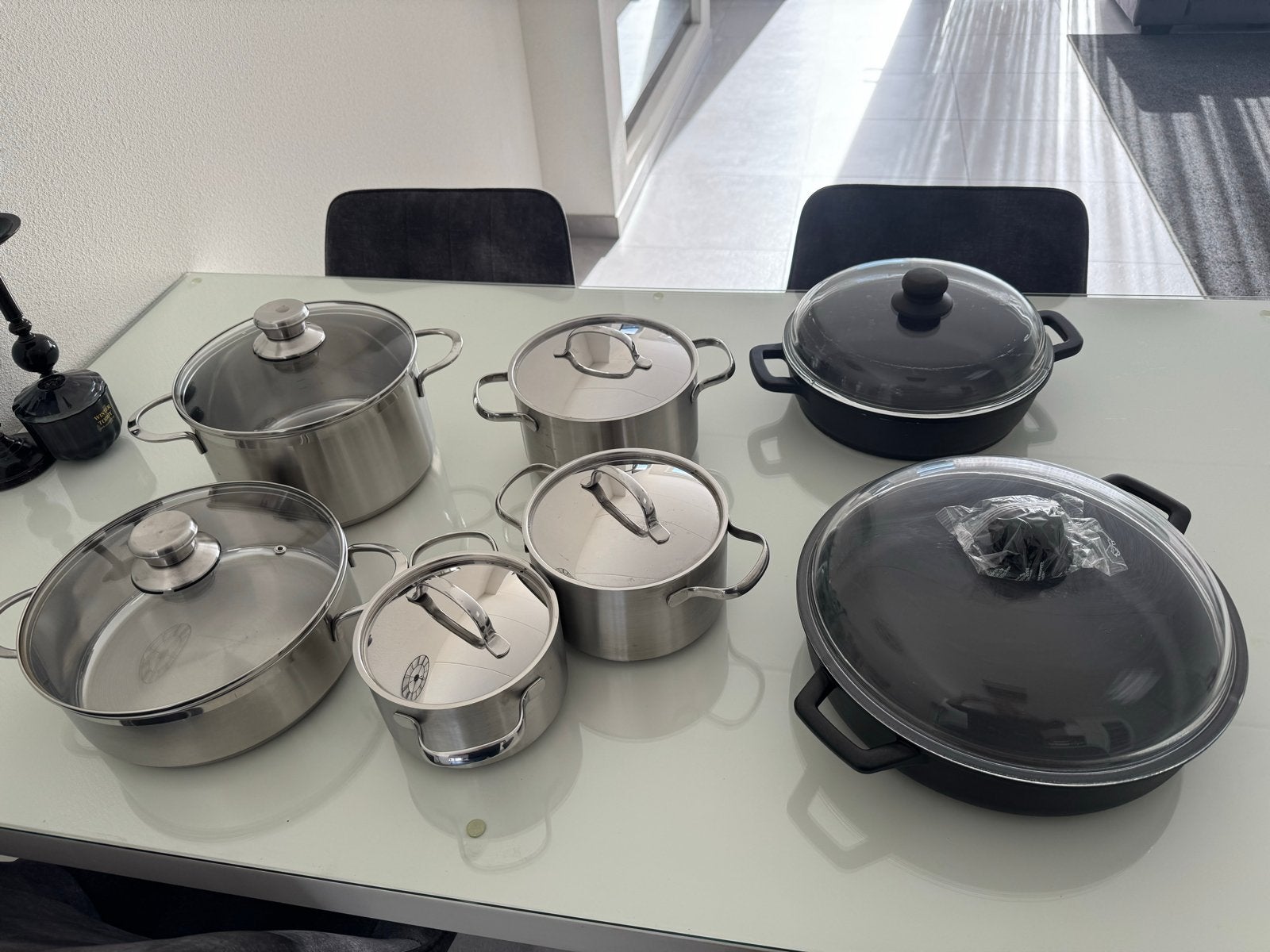 Complete pannenset - RVS en gietijzeren pannen, Gebruikt, Met deksel, Pannenset, Ophalen of Verzenden