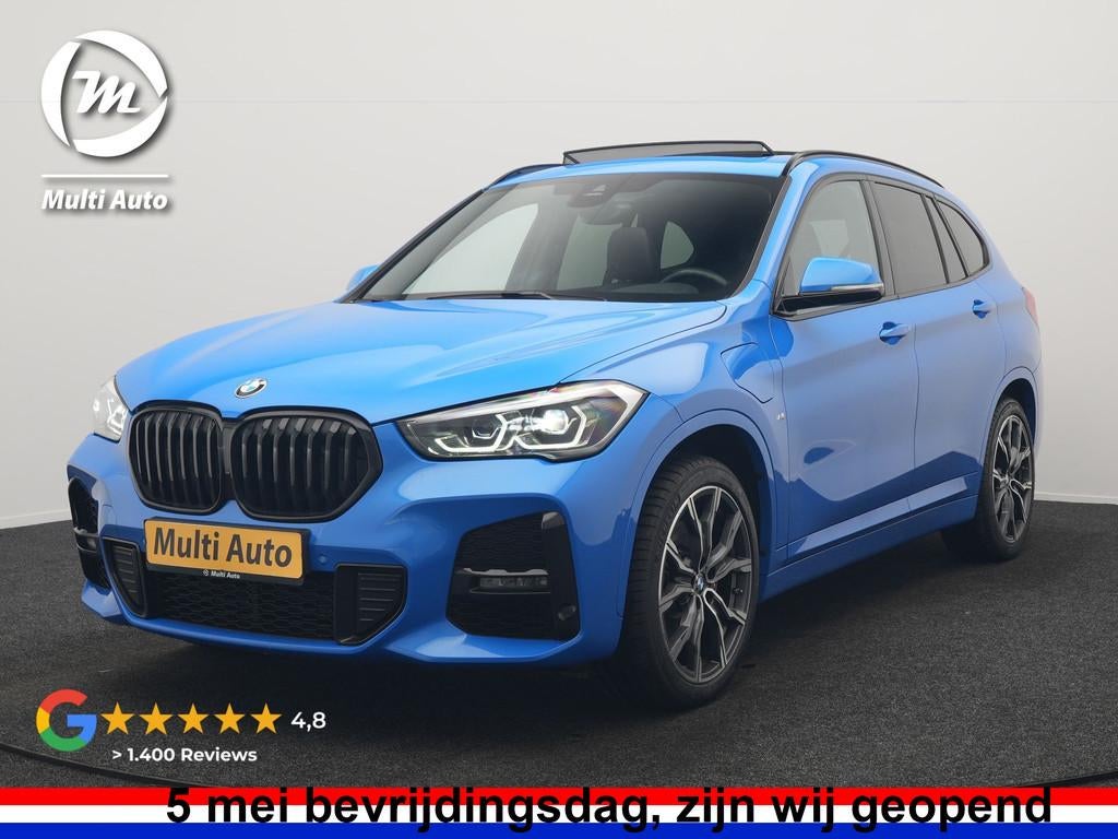 BMW X1 xDrive25e M Sport PHEV 221pk Dealer O.H | Trekhaak Af, Auto's, BMW, Gebruikt, Blauw, Leder en Stof, Bedrijf