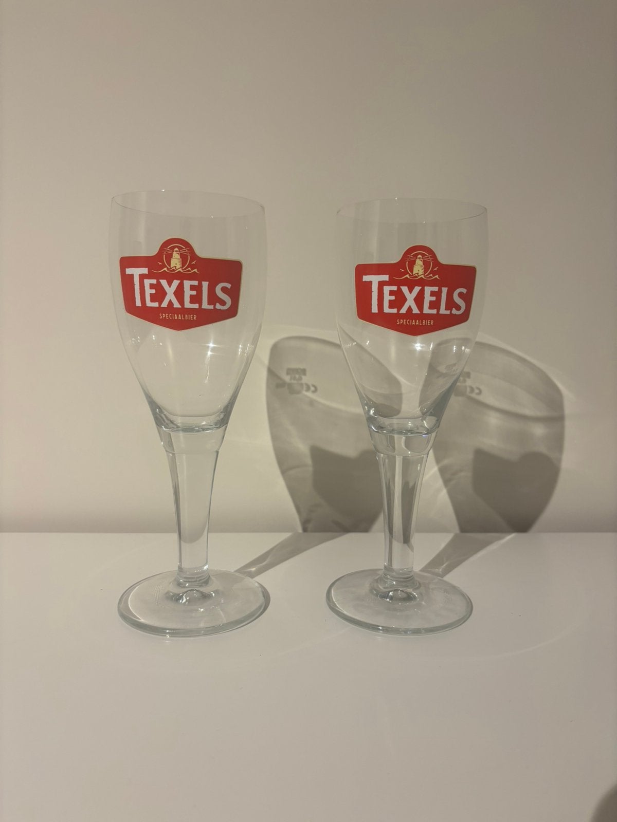 Twee Texels bierglazen, Ophalen of Verzenden, Zo goed als nieuw, Glas of Glazen, Overige merken