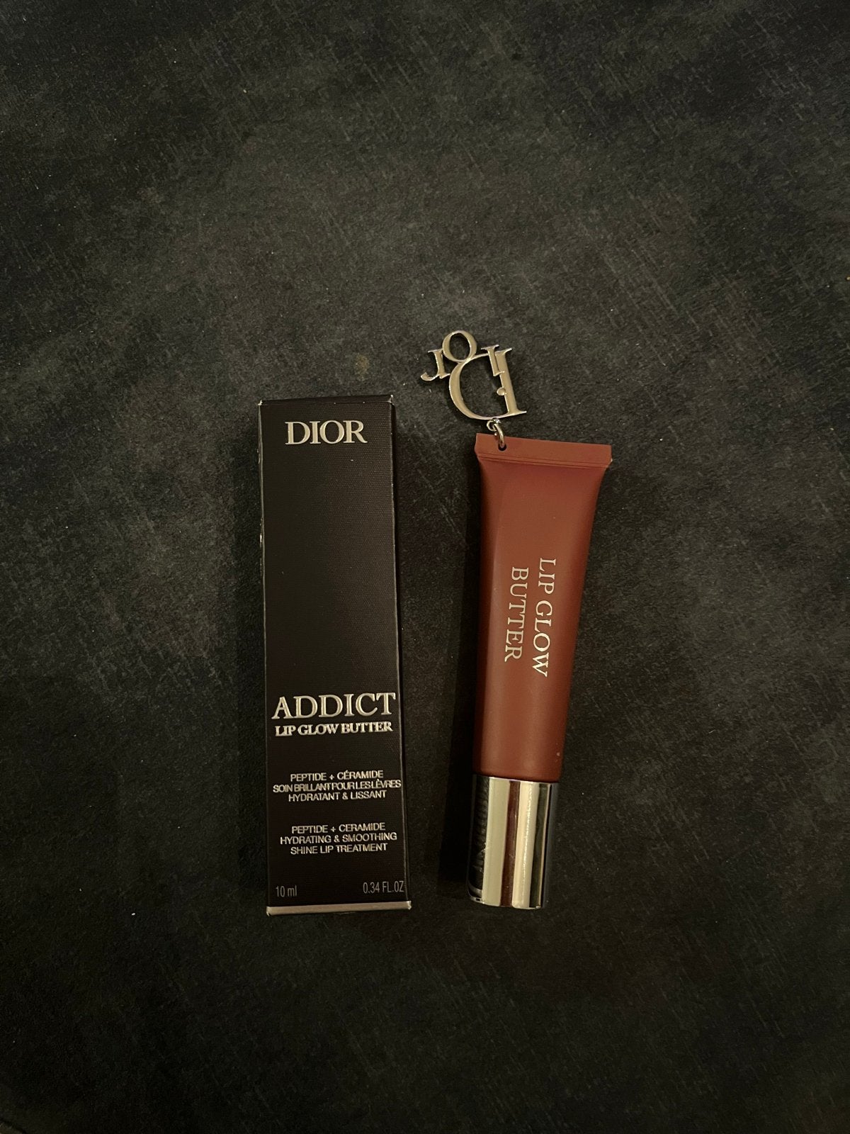 Dior Addict Lip Glow Butter 104 Black Cherry, Ophalen of Verzenden, Zo goed als nieuw, Make-up, Overige kleuren