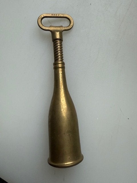 Vintage kurkentrekker in de vorm van een fles, Ophalen of Verzenden, Brons