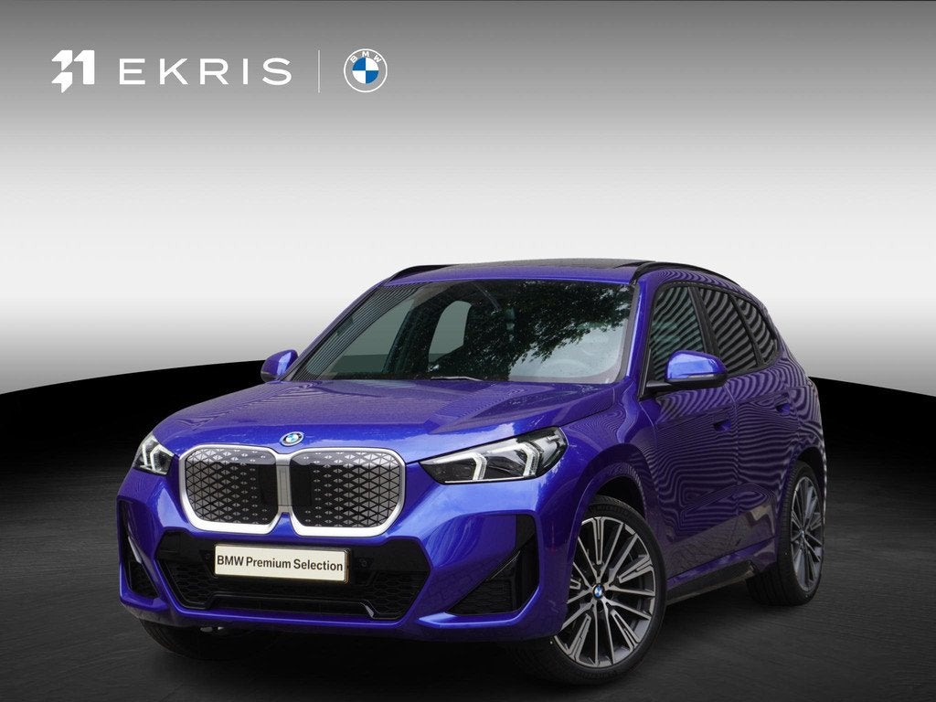 BMW iX1 eDrive20 M Sportpakket | Premium Pack | Trekhaak met, Auto's, BMW, 514 km, Met garantie (alle), Blauw, 204 pk