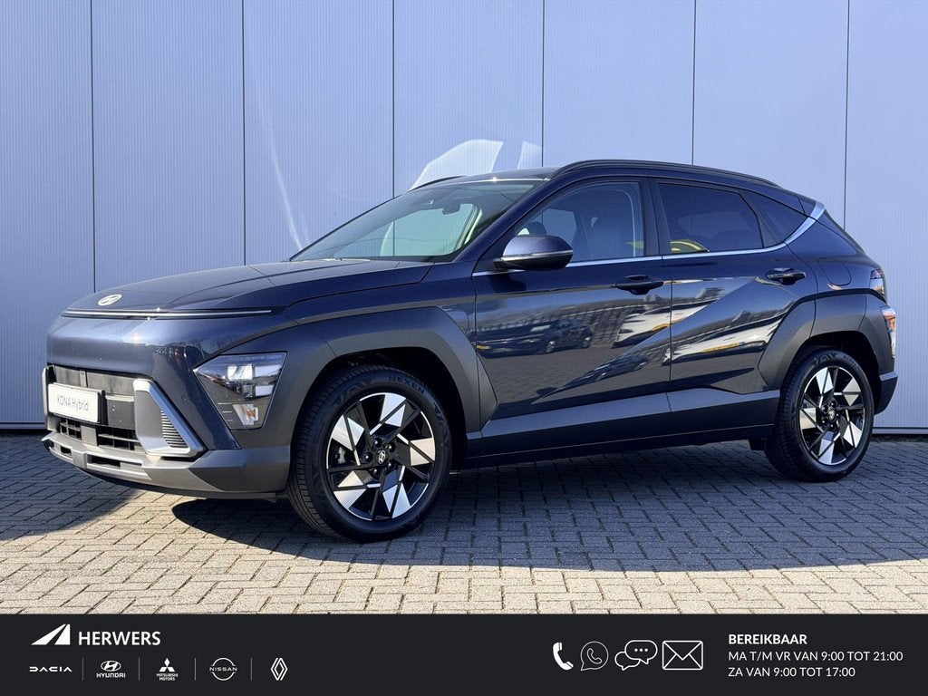 Hyundai Kona 1.6 GDI HEV Comfort Smart / Fabrieksgarantie to, Auto's, Hyundai, Stof, Gebruikt, Euro 6, Blauw