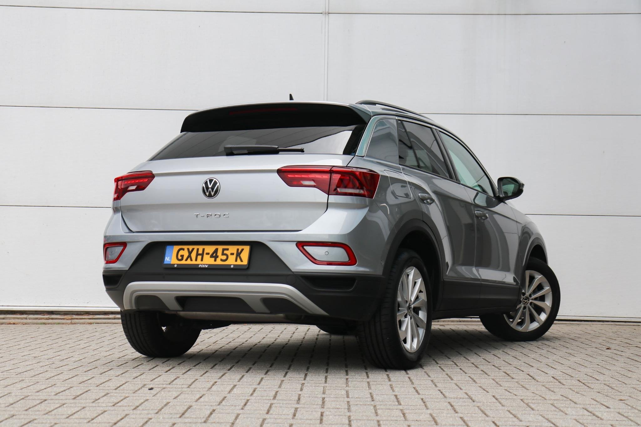 Volkswagen T-Roc 1.0 TSI 115pk Oranje Edition | App Connect, Auto's, Voorwielaandrijving, 12 maanden, Stof, Gebruikt