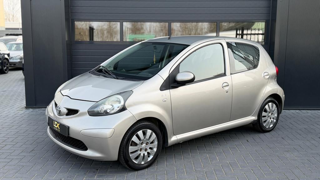Toyota Aygo 1.0-12V + Airco|Automaat|5deurs, Auto's, Gebruikt, Bruin, 4 stoelen, 68 pk