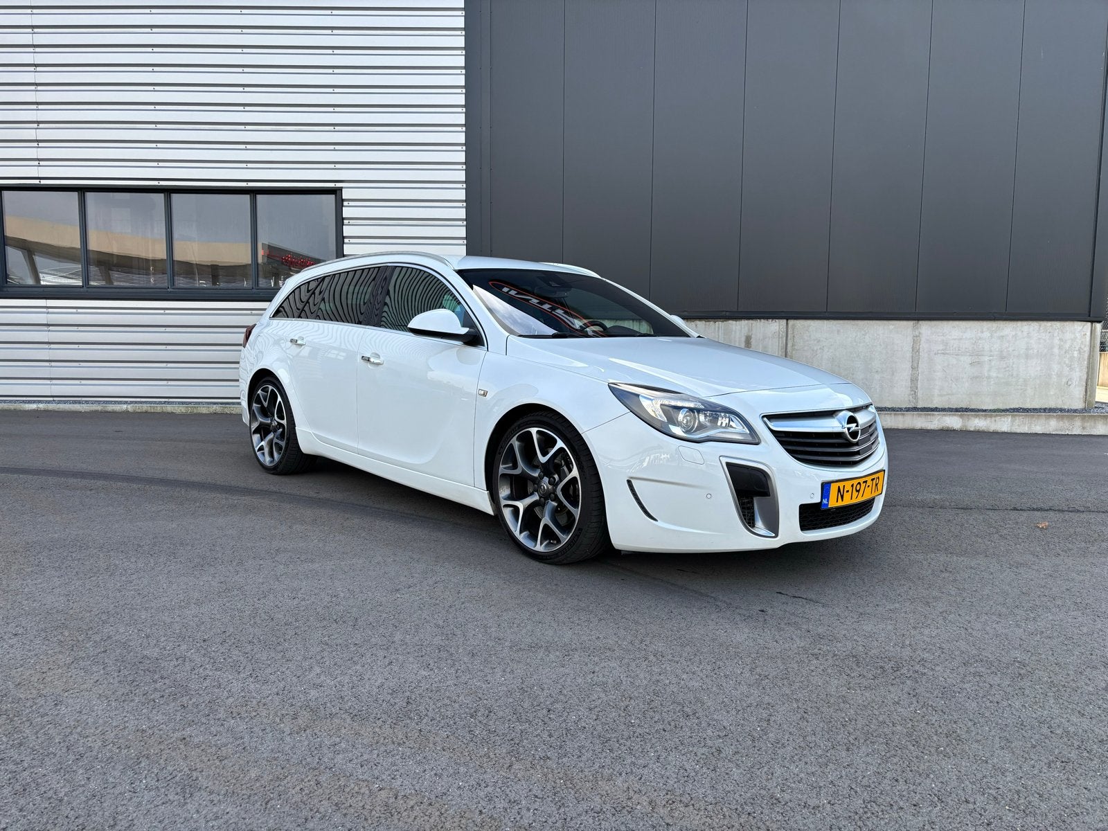 Opel Insignia OPC 2.8 V6 Turbo 325pk 4x4 Aut. 2014 Wit, Auto's, Automaat, Zwart, Leder, Stationwagon
