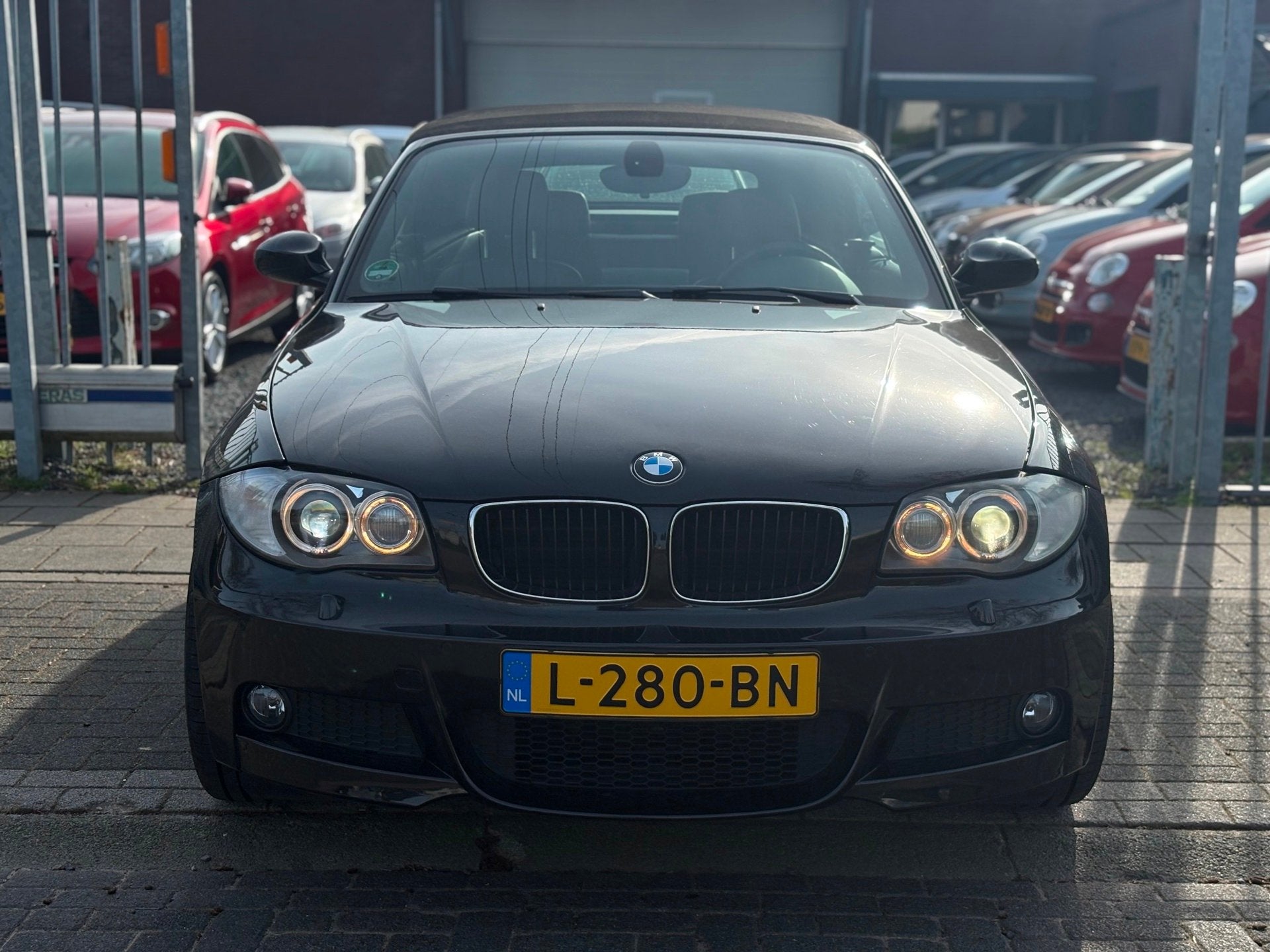 BMW 1-serie Cabrio 120i | M-Sport uitgevoerd | Xenon | Leder, Auto's, BMW, 4 cilinders, Cabriolet, Zwart, Leder