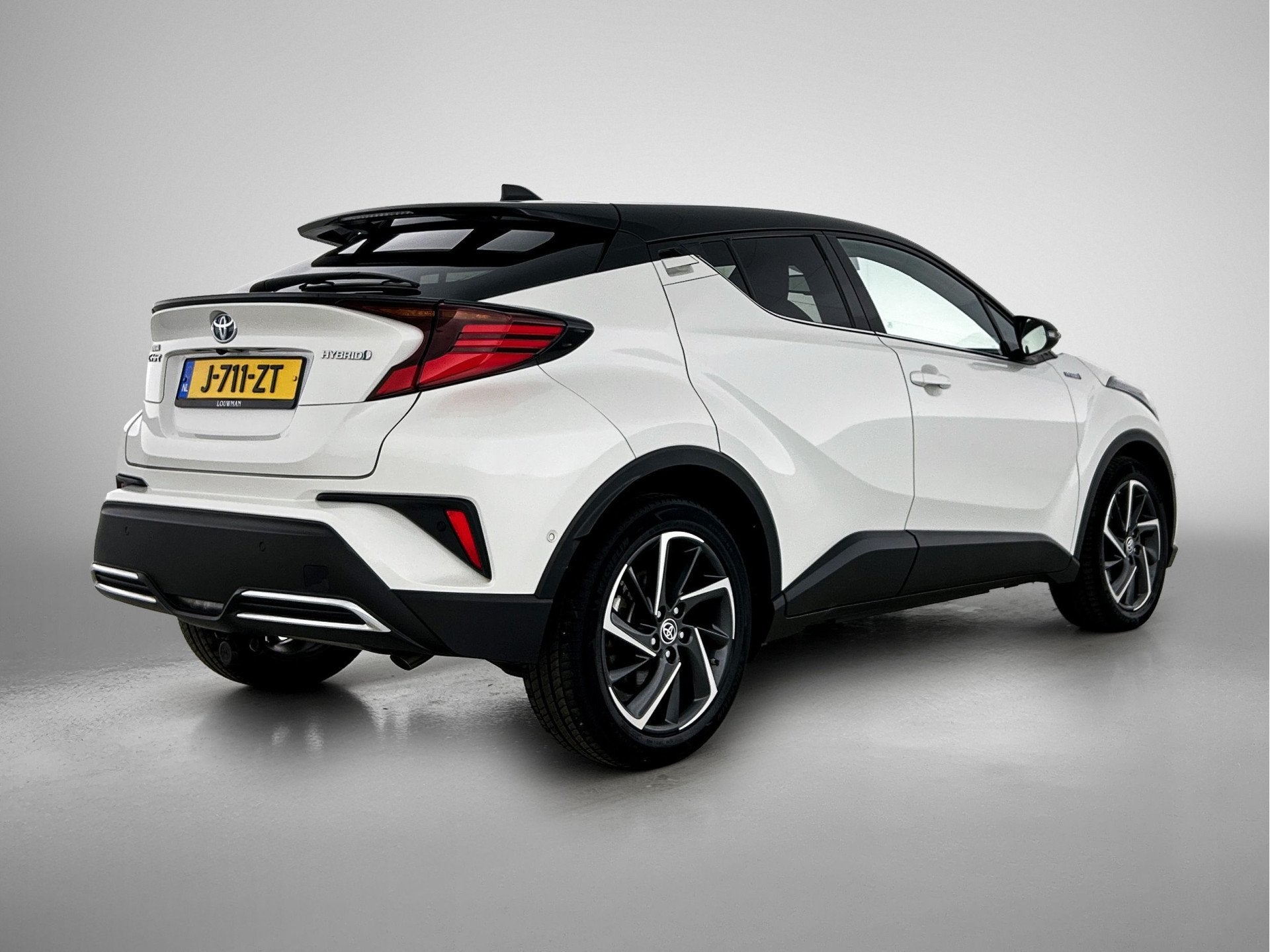 Toyota C-HR 2.0 Hybrid Bi-Tone | Navigatie | Stoelverwarming, Auto's, 12 maanden, Stof, 4 cilinders, Wit