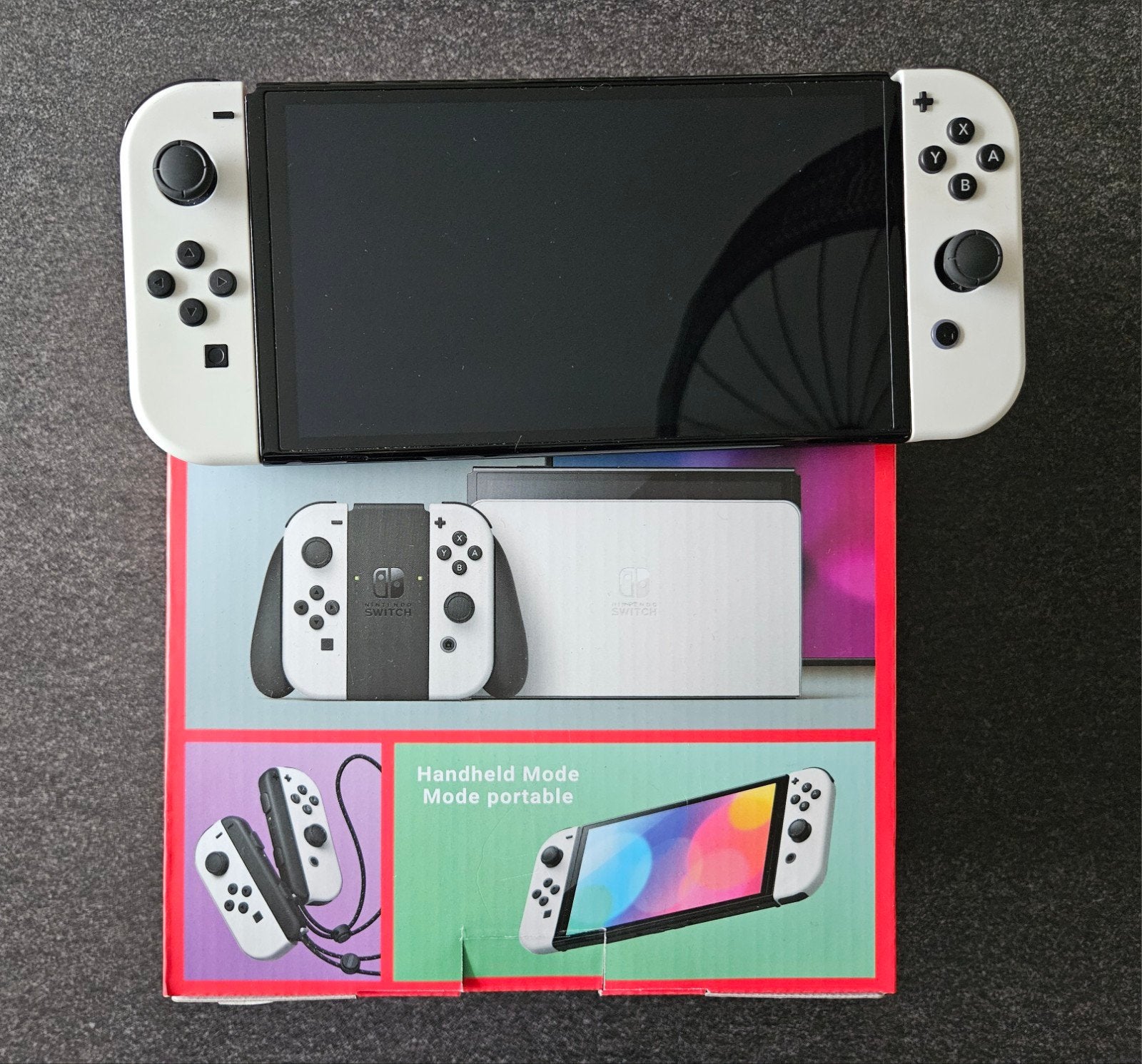 Foto 3 van Nintendo Switch OLED Wit + 3 Games & Accessoires