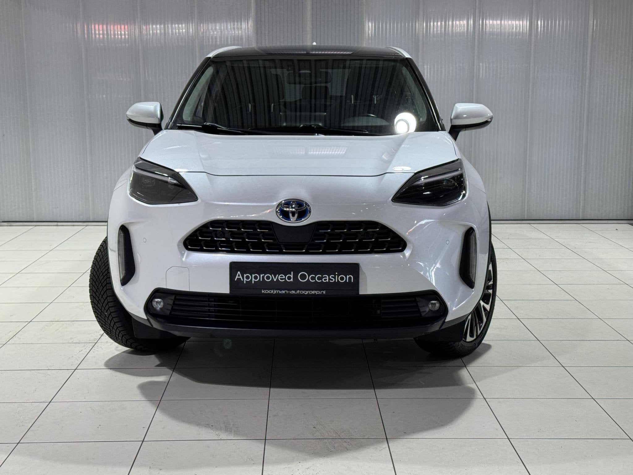Toyota Yaris Cross 1.5 Hybrid Executive Panoramadak, Stoelve, Auto's, Gebruikt, Wit, 1490 cc, Bedrijf
