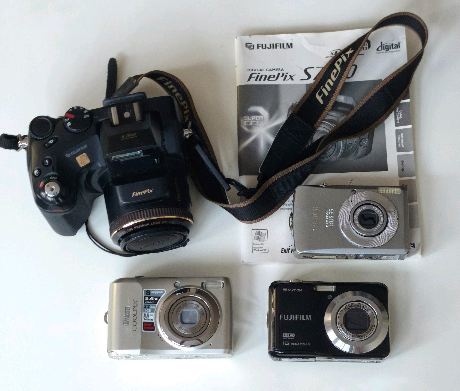 Partij defecte camera's - voor onderdelen, Ophalen of Verzenden, Niet werkend, Handleiding, Compactcamera