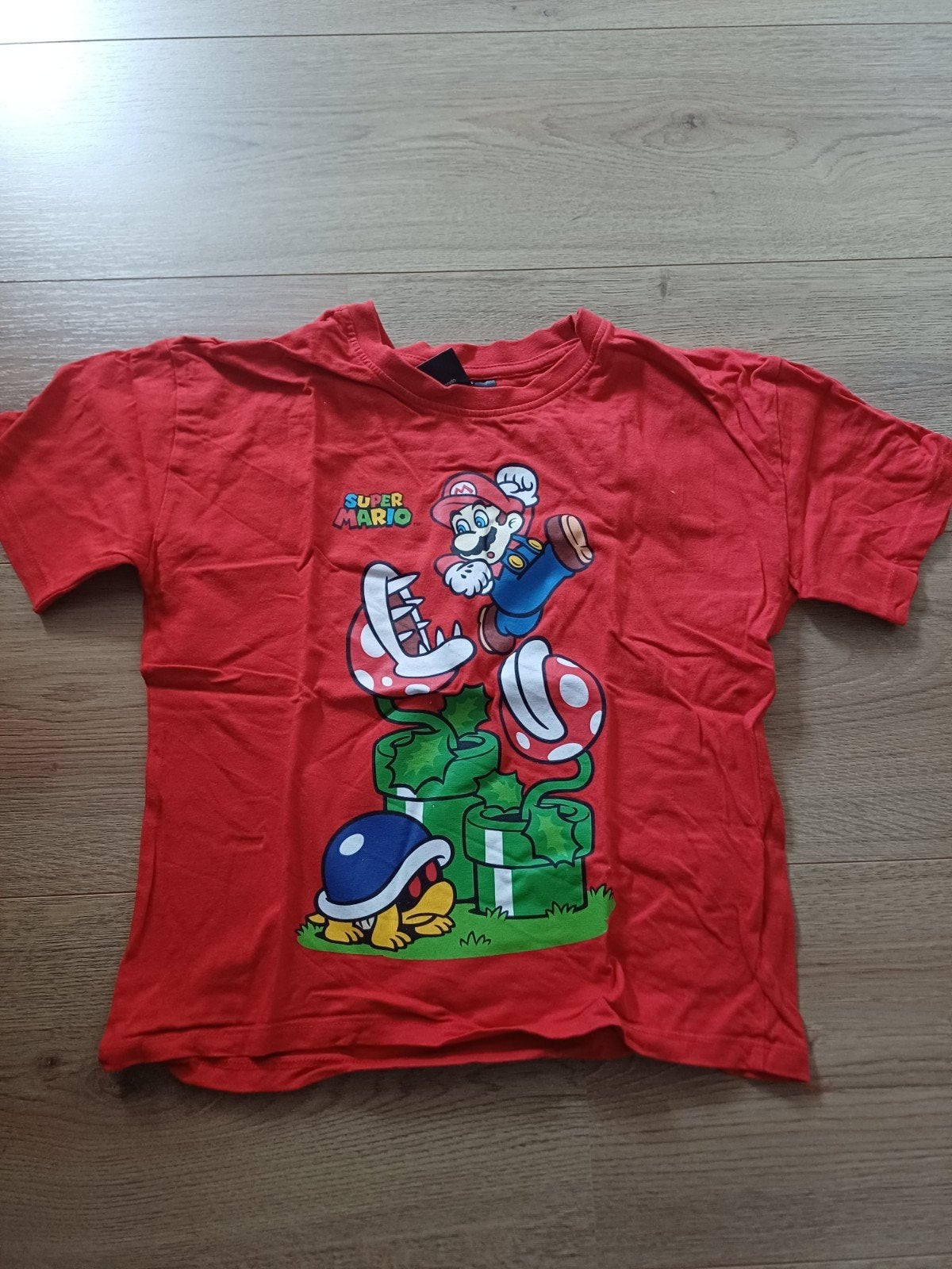 Super Mario shirt maat 122/128, Super Mario, Ophalen of Verzenden, Zo goed als nieuw, Shirt of Longsleeve