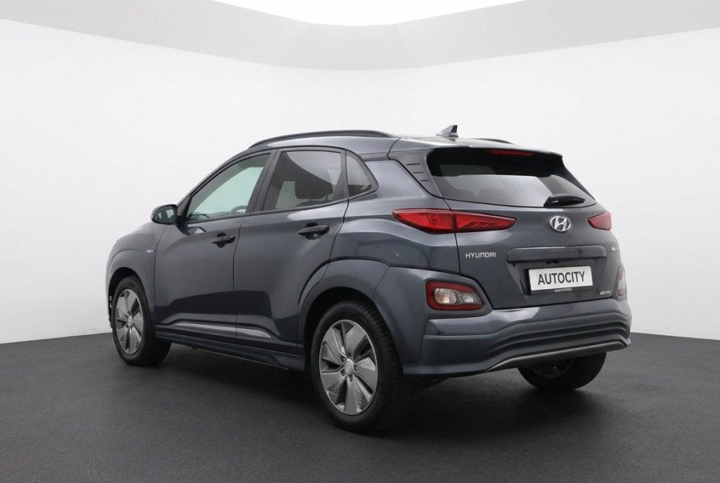 Hyundai KONA EV Premium 64 kWh 100% SOH Origineel NL | Leder, Auto's, Automaat, 0 cilinders, Gebruikt, Leder