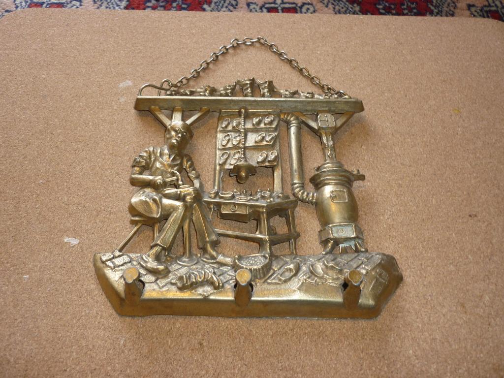Vintage koperen sleutelhanger met een reliëfafbeelding, Ophalen of Verzenden, Koper