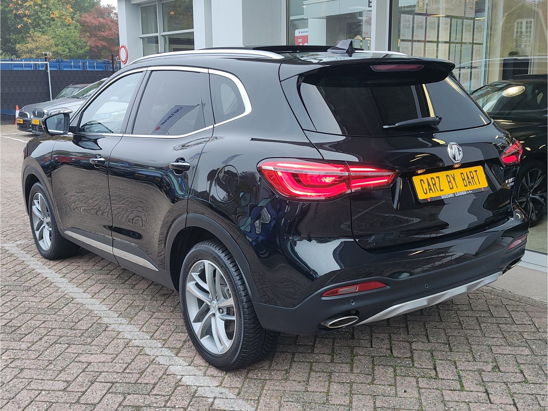 MG EHS 1.5 TGDI PHEV HYBRID LUXURY SoH 97,87% ! | Leder | 36, Auto's, Gebruikt, Zwart, 4 cilinders, Zwart