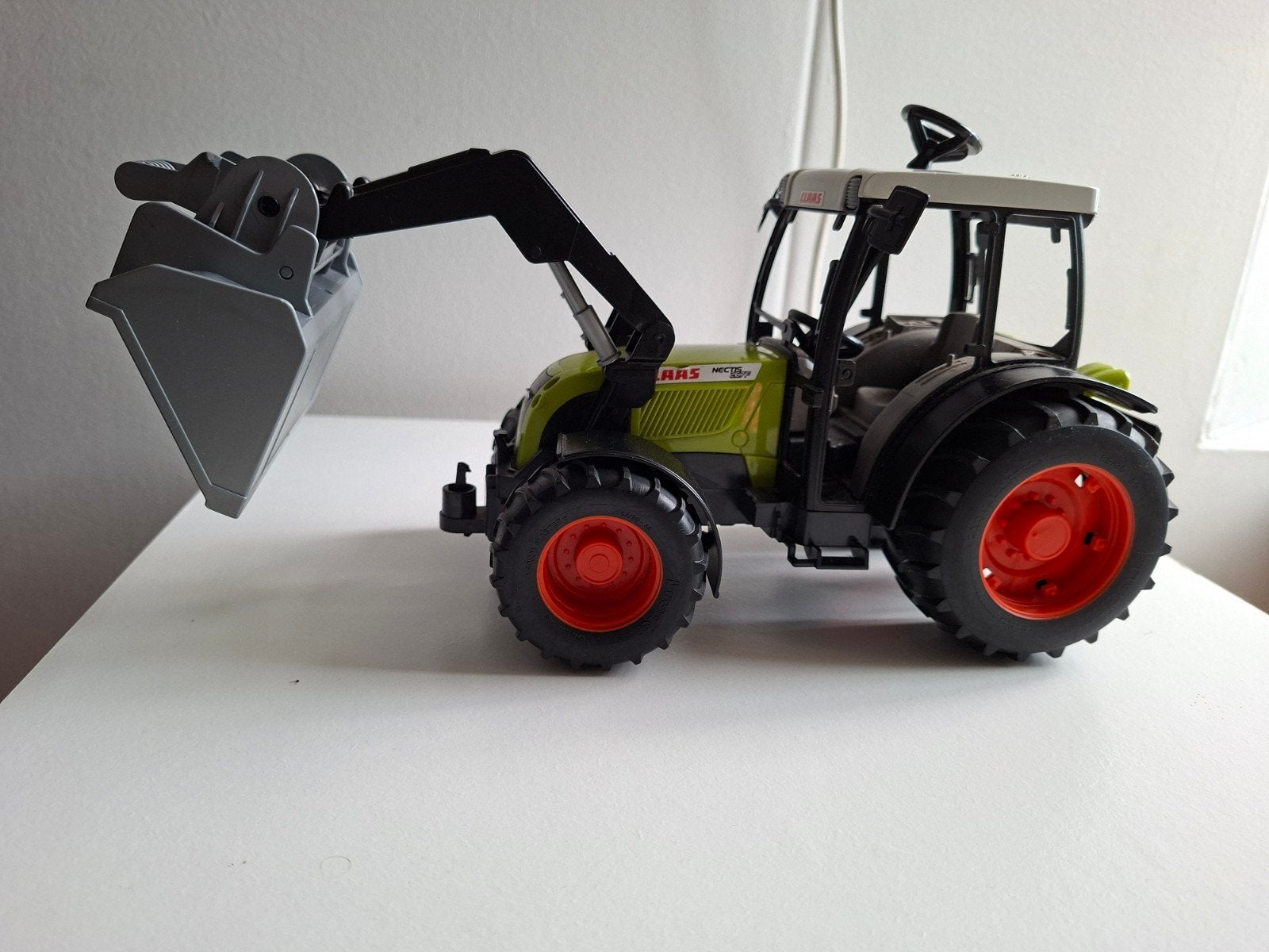 Claas tractor met voorlader - Speelgoed, Ophalen of Verzenden, Zo goed als nieuw