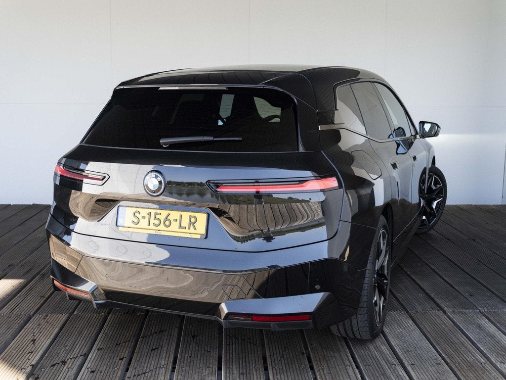 BMW iX xDrive40 | Sportpakket | 22 inch | Comfort Access | G, Auto's, BMW, Stof, Gebruikt, Met garantie (alle), Zwart