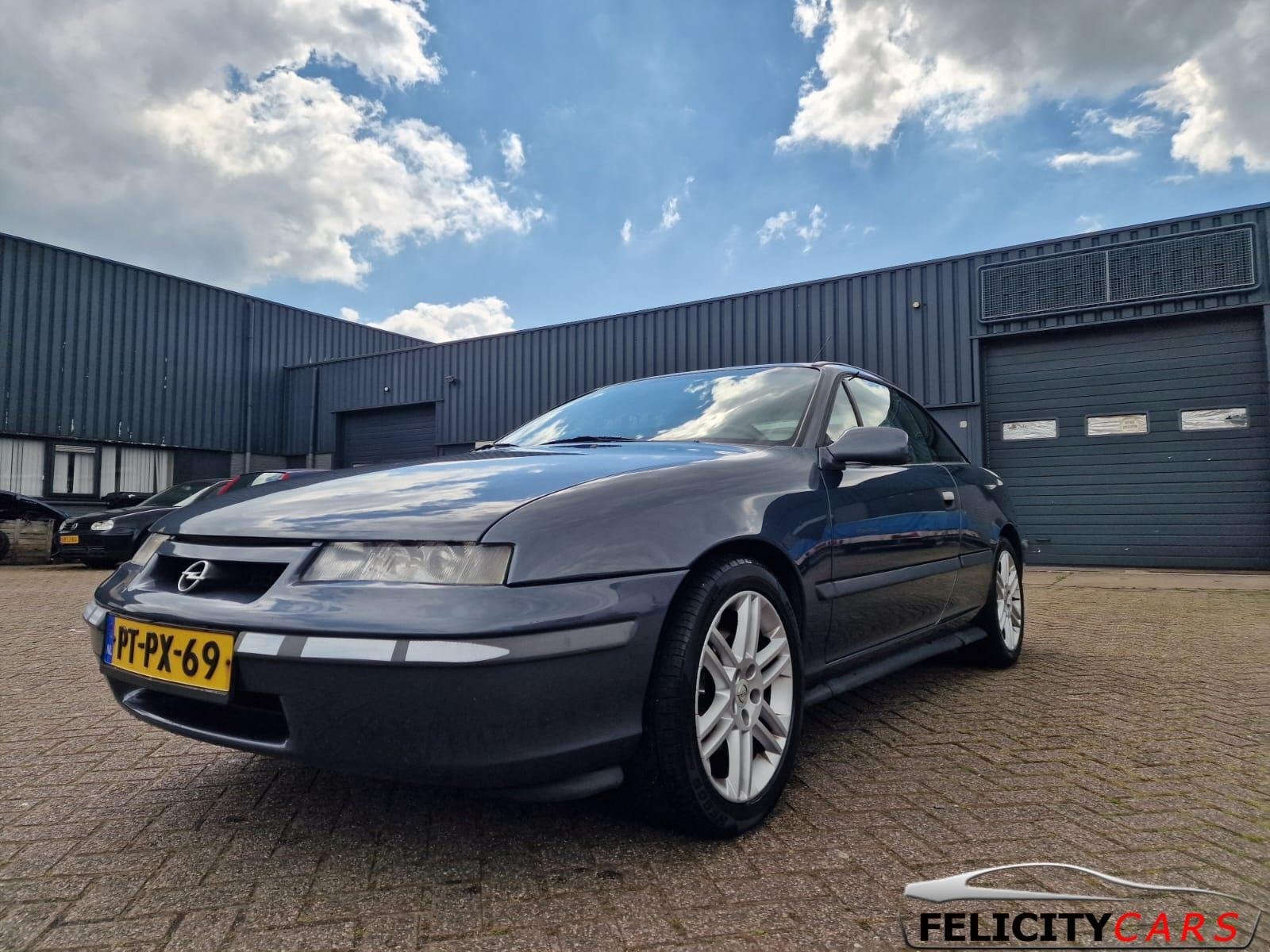 Opel Calibra 2.5i V6 Leer airco aut '96 met taxatie, Auto's, Oldtimers, 2498 cc, Bedrijf, Opel, 170 pk