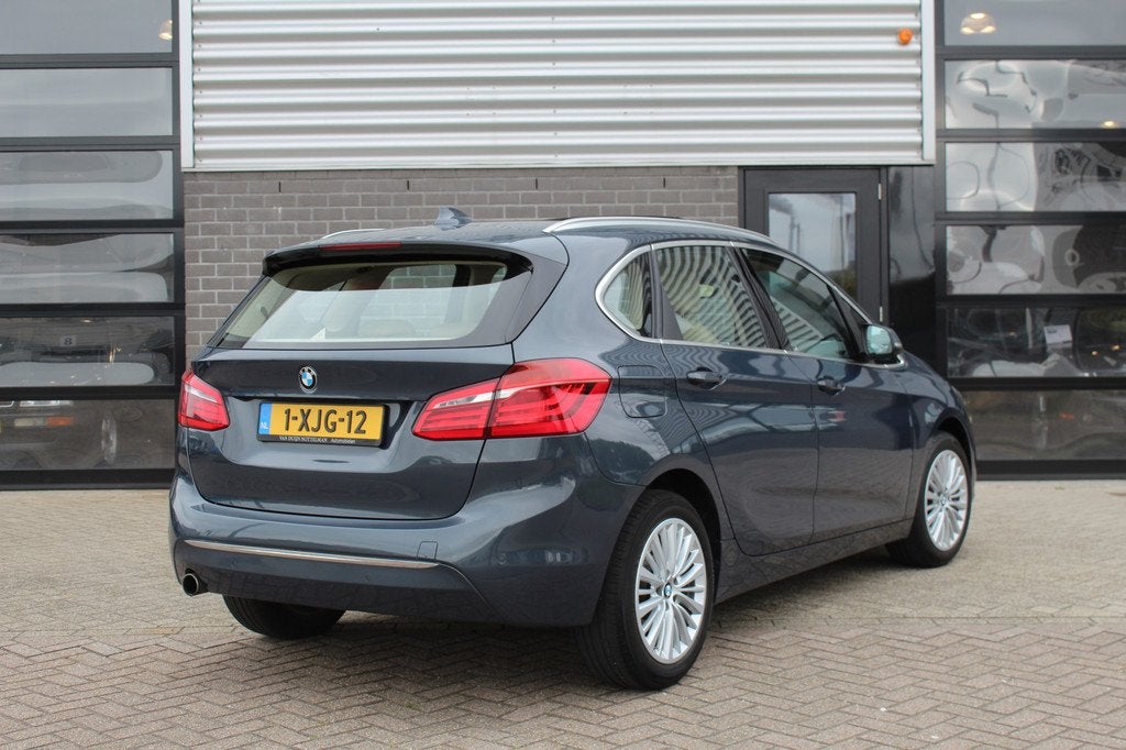 BMW 2 Serie Active Tourer 218i High Executive / Panoramadak, Auto's, BMW, Voorwielaandrijving, 136 pk, Gebruikt, Met garantie (alle)