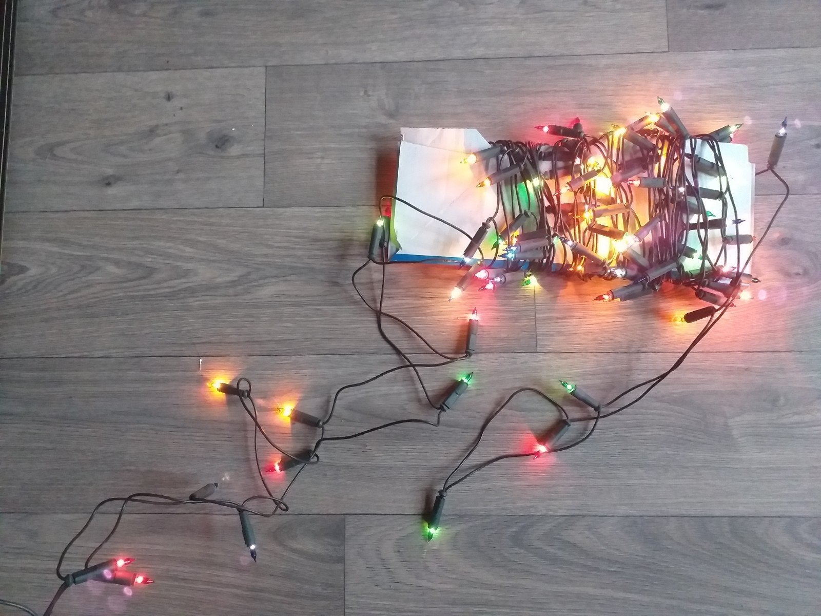 Gekleurde kerstboomlampjes, Ophalen