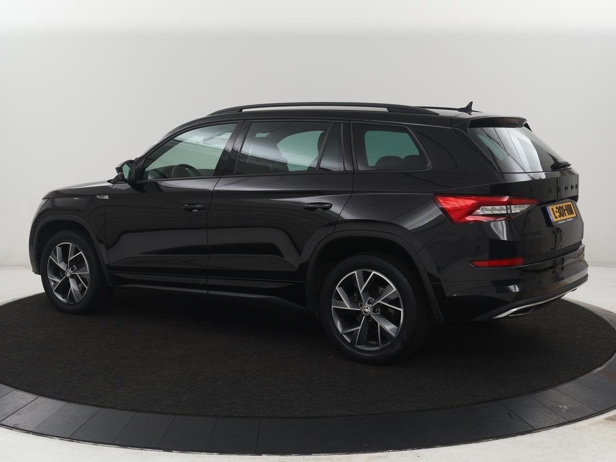 Skoda Kodiaq 1.5 TSI Sportline Business | Leder/alcantara |, Auto's, Skoda, 4 cilinders, 150 pk, Zwart, Origineel Nederlands